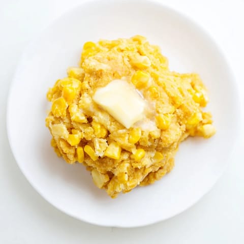 Warm, buttery corn flapjacks with visible corn kernels, perfect for a cozy weekend brunch at home.