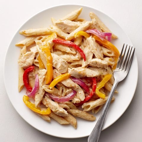 A light skillet meal featuring tender chicken strips and al dente penne in a spicy, creamy Cajun sauce.  