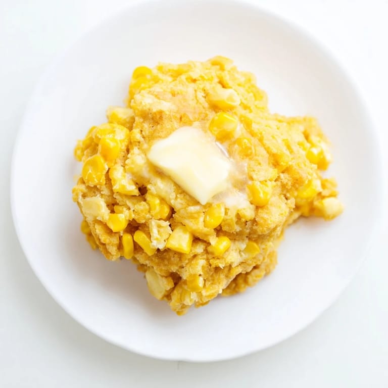 Warm, buttery corn flapjacks with visible corn kernels, perfect for a cozy weekend brunch at home.